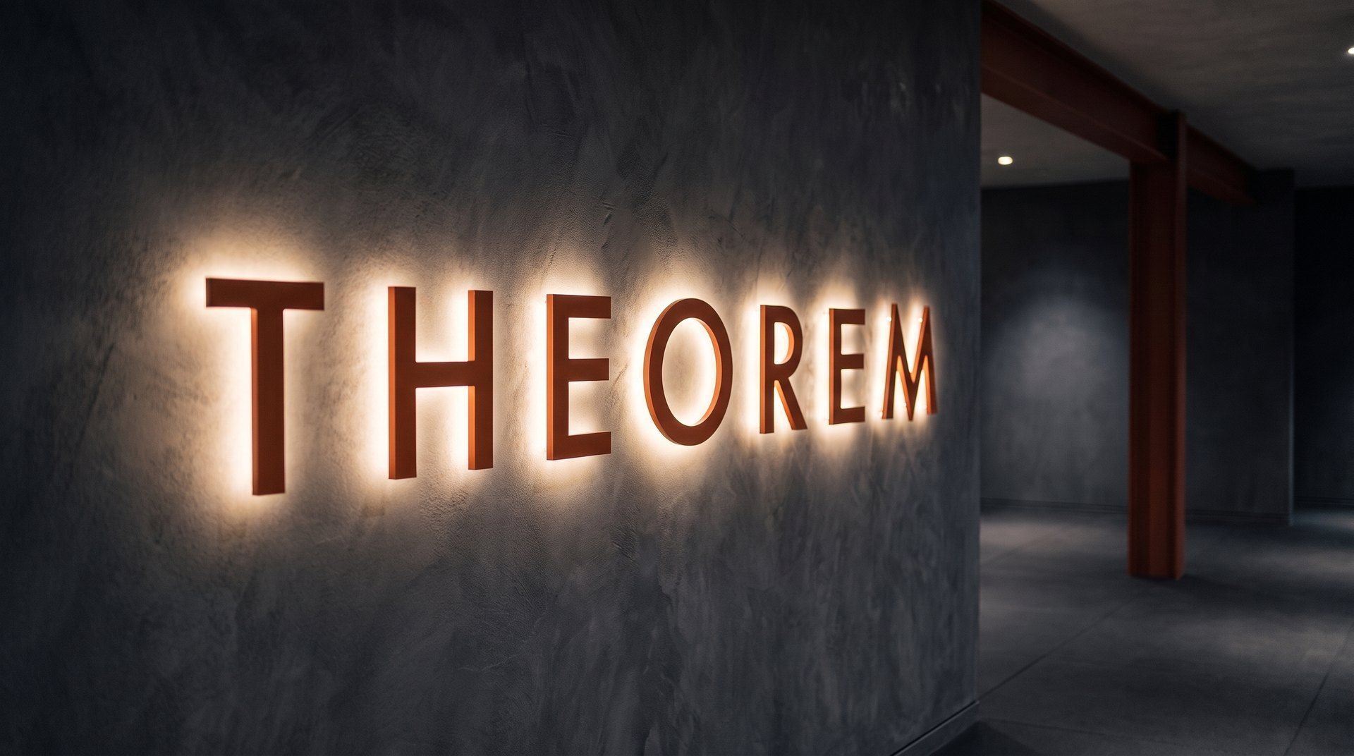 The Theorem name in burnt-orange letters, halo-lit on charcoal plaster